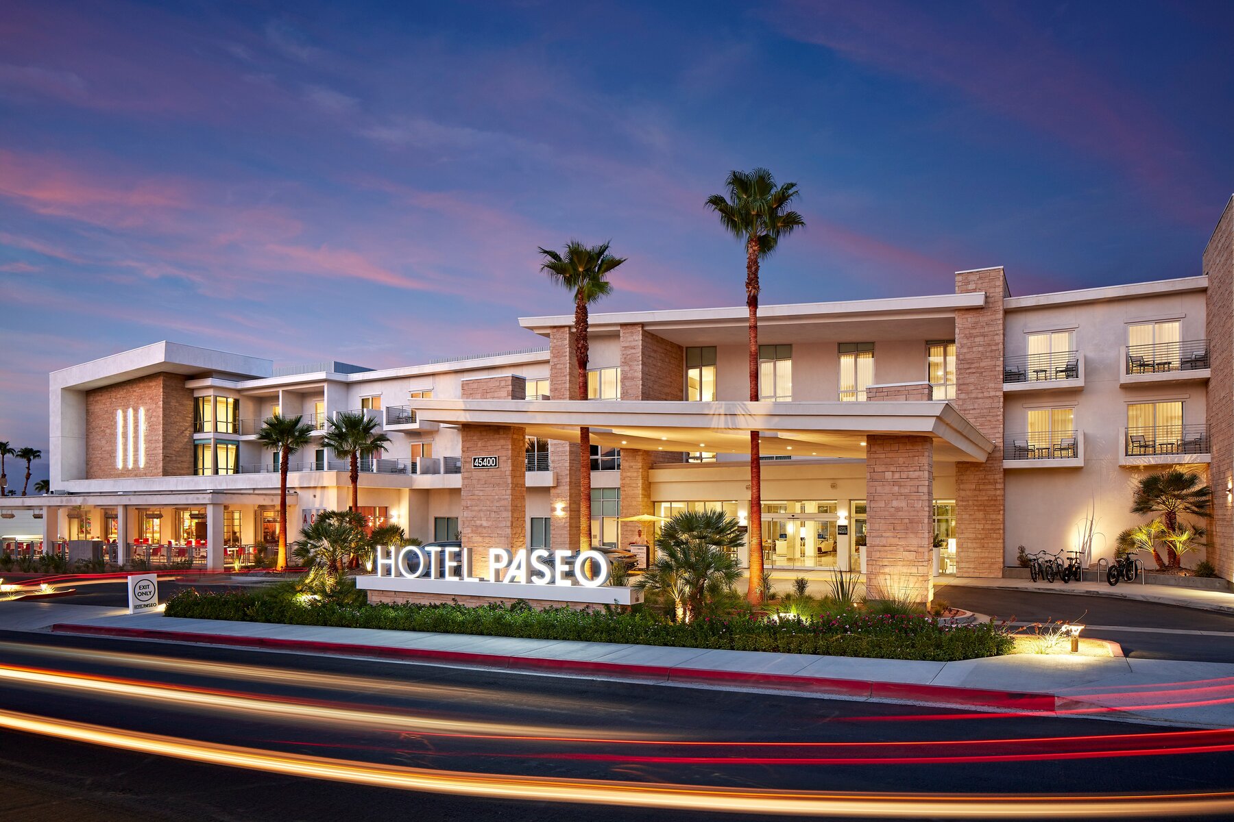 Hotel Paseo exterior in Palm Desert at dusk